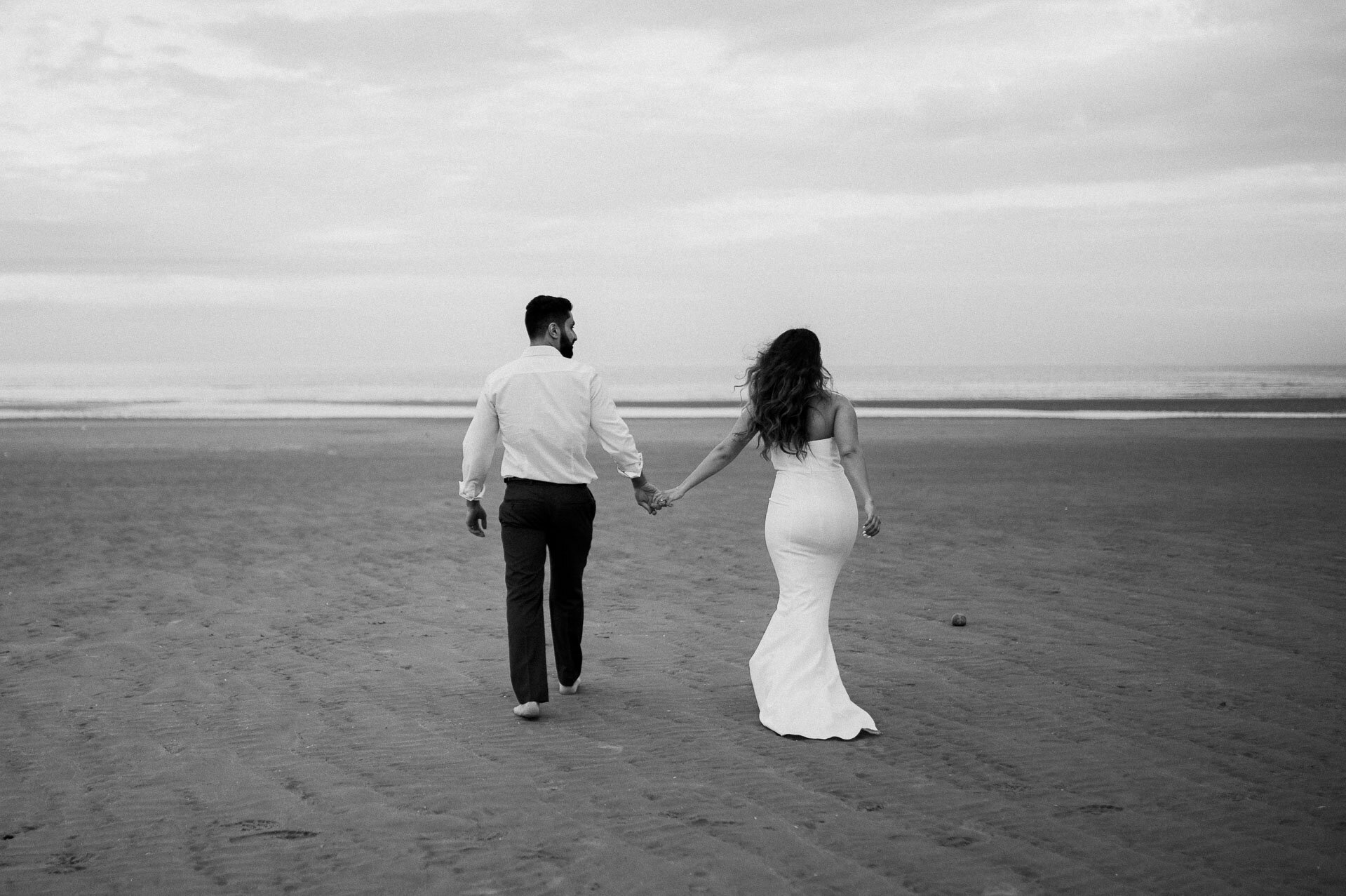 Demiana and Goergeuos - Camber Sands Golden Hour Beach Shoot - Laura Williams Photography-15.jpg