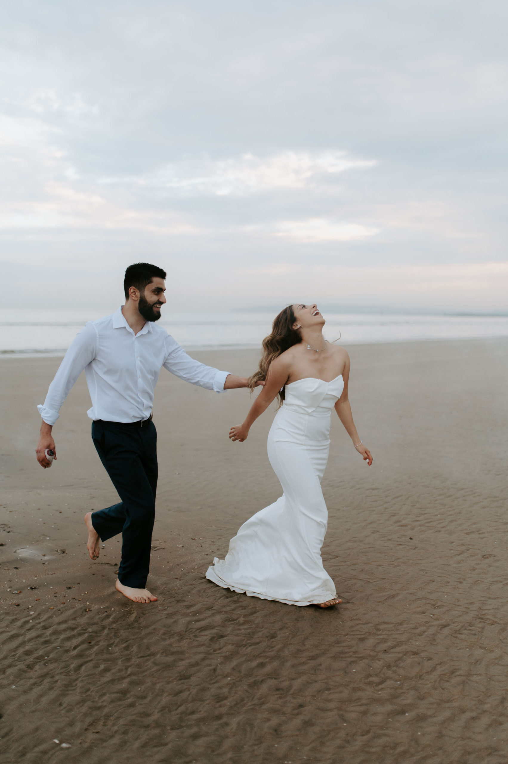 Demiana and Goergeuos - Camber Sands Golden Hour Beach Shoot - Laura Williams Photography-34.jpg