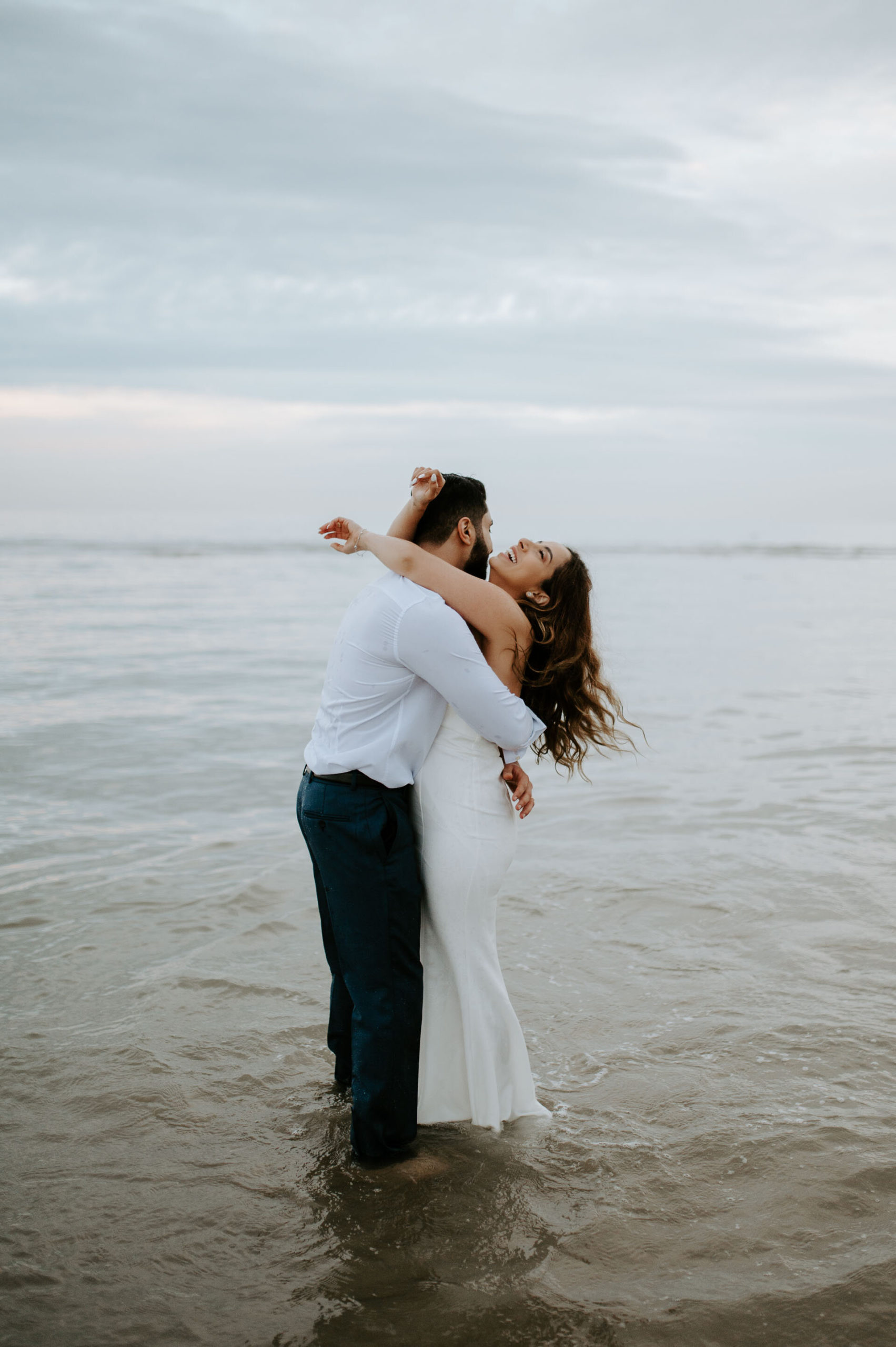Demiana and Goergeuos - Camber Sands Golden Hour Beach Shoot - Laura Williams Photography-50.jpg