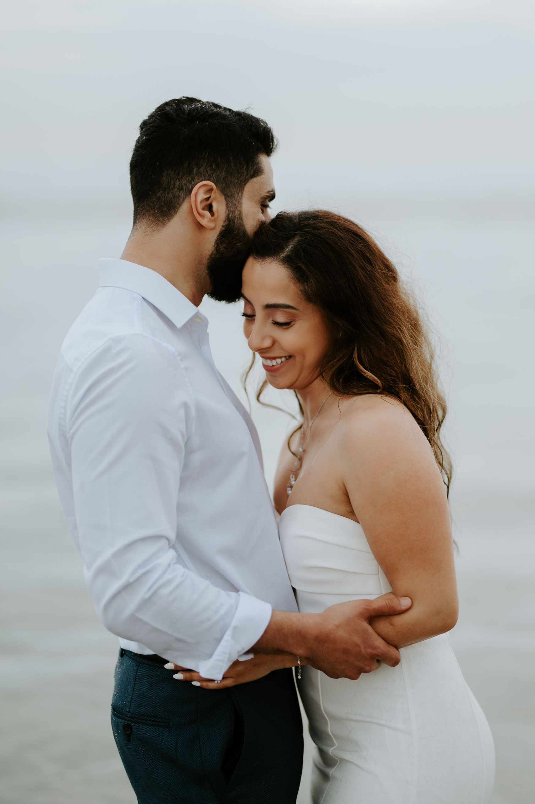 Demiana and Goergeuos - Camber Sands Golden Hour Beach Shoot - Laura Williams Photography-52.jpg