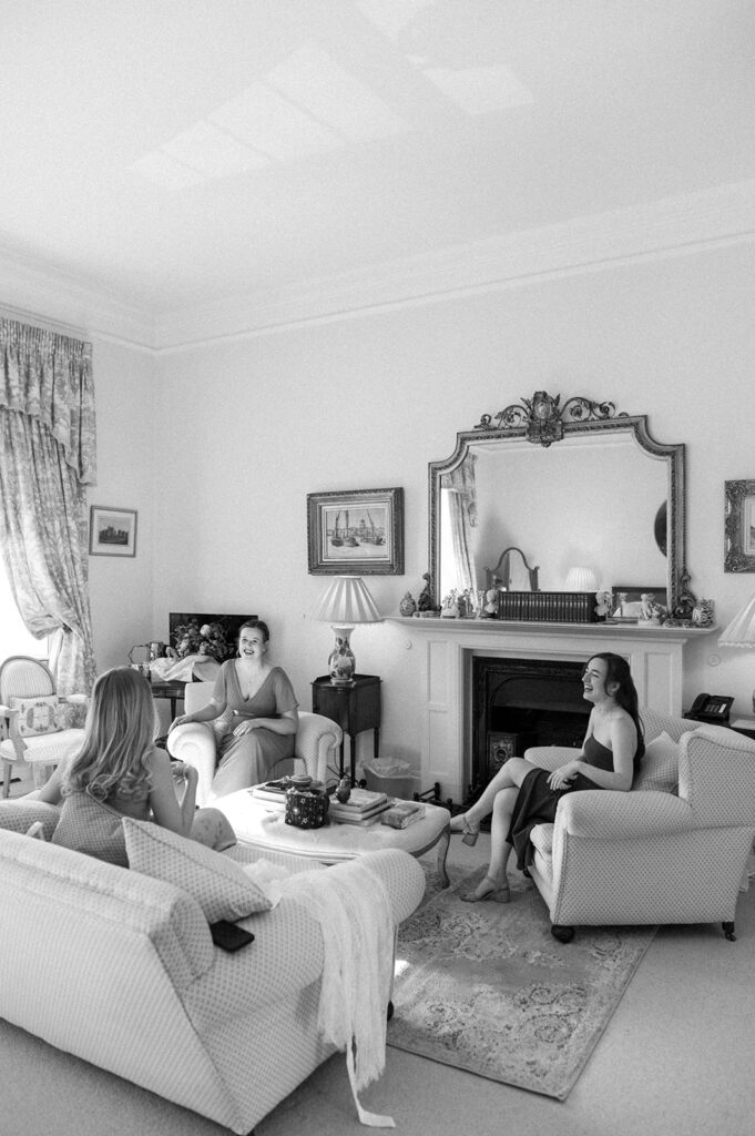 bridesmaids laughing candidly during bridal prep
