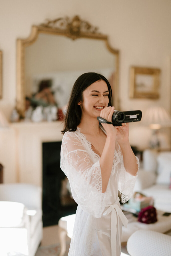 bride filming with 2000s digital camcorder