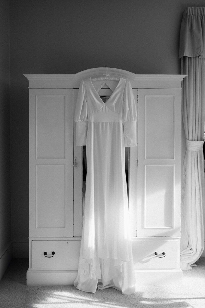 wedding dress on hanger at sandon manor