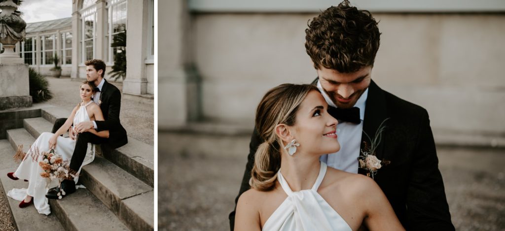 bride and groom sitting on steps outside syon park