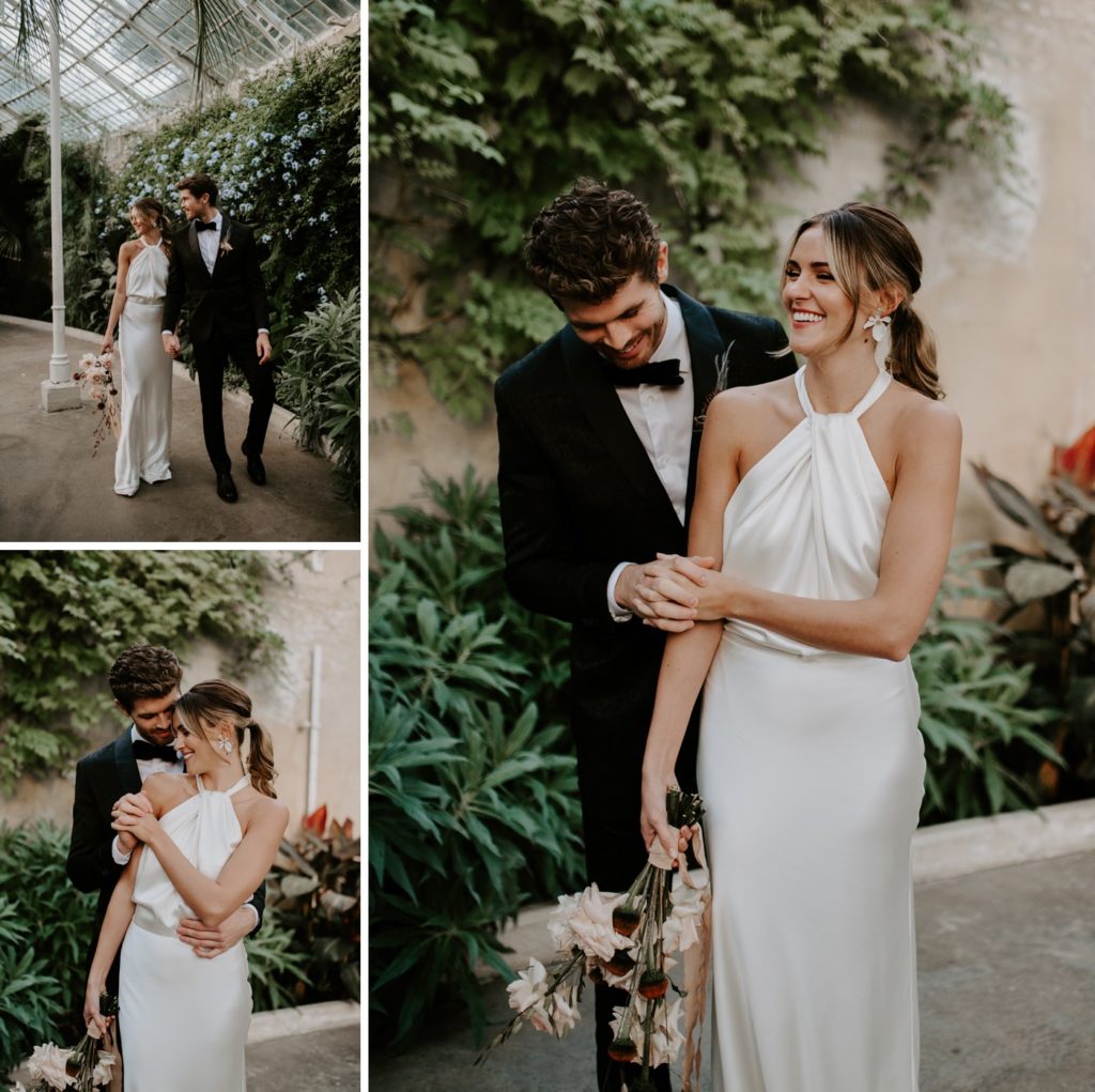 bride and groom walking  in conservatory in syon park