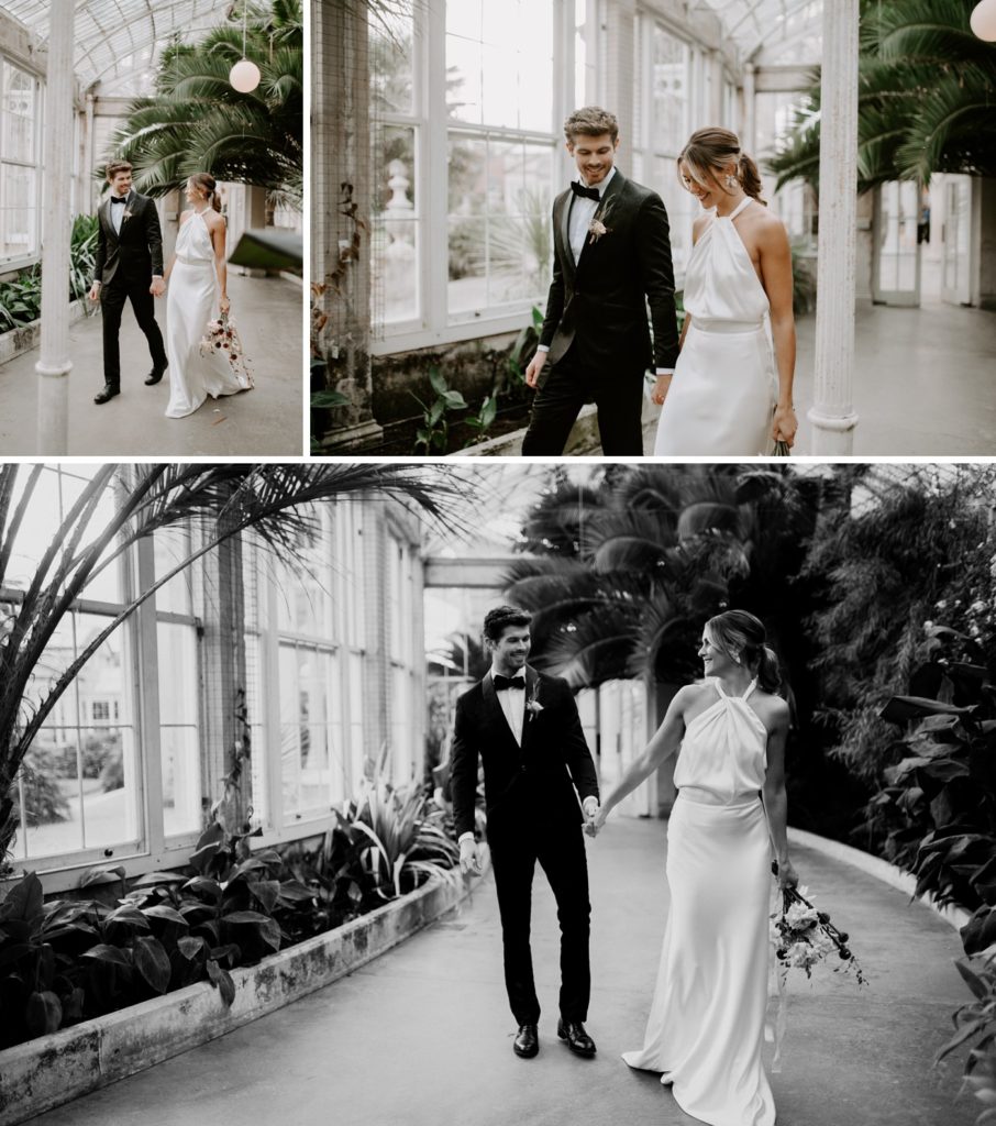 bride and groom walking  in conservatory in syon park