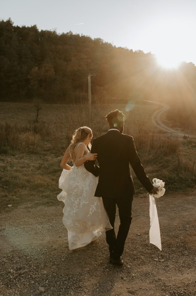 couple walking away at golden hour at this must be the place barcelona wedding venue