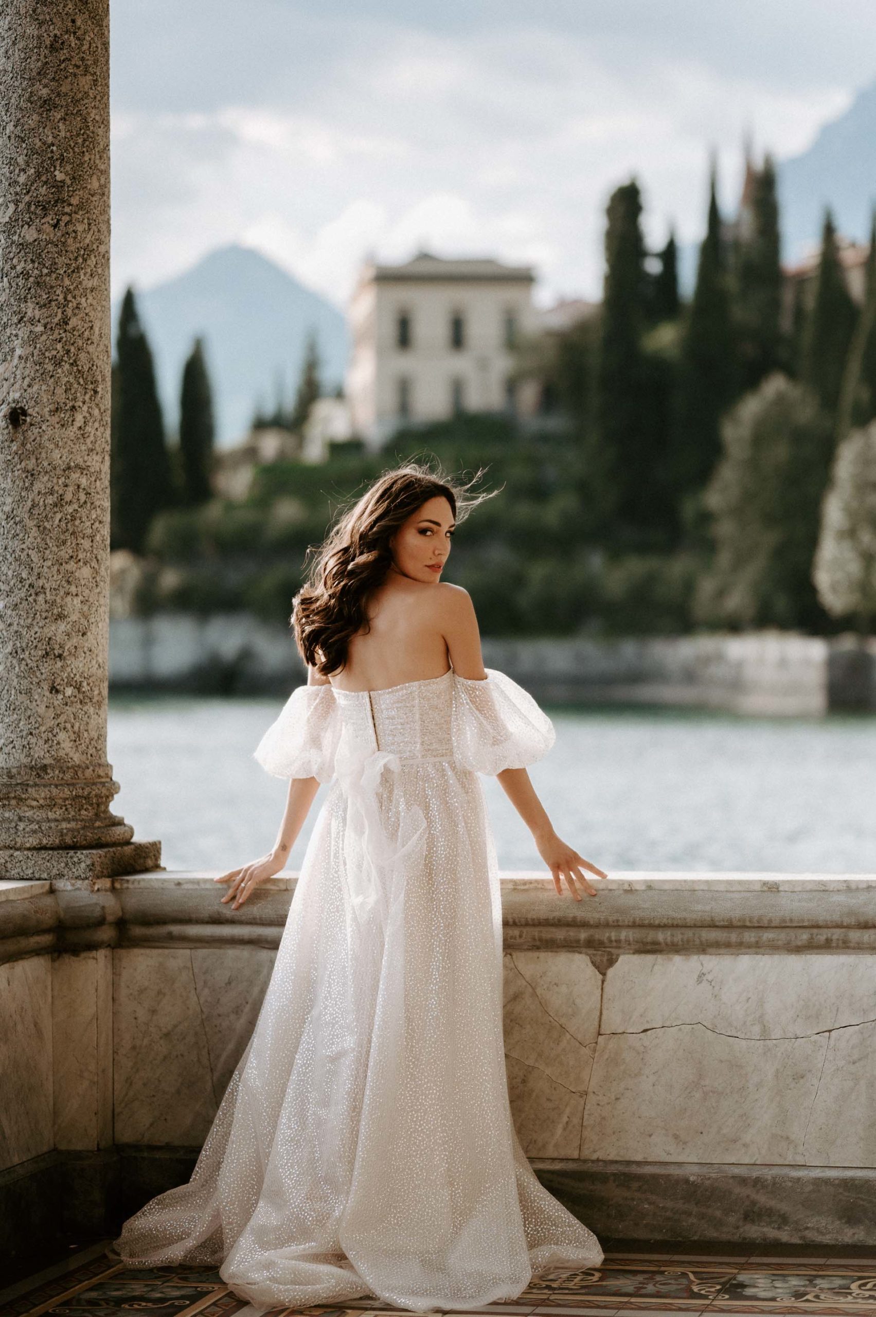 bride in lake como italy wearing berta dress