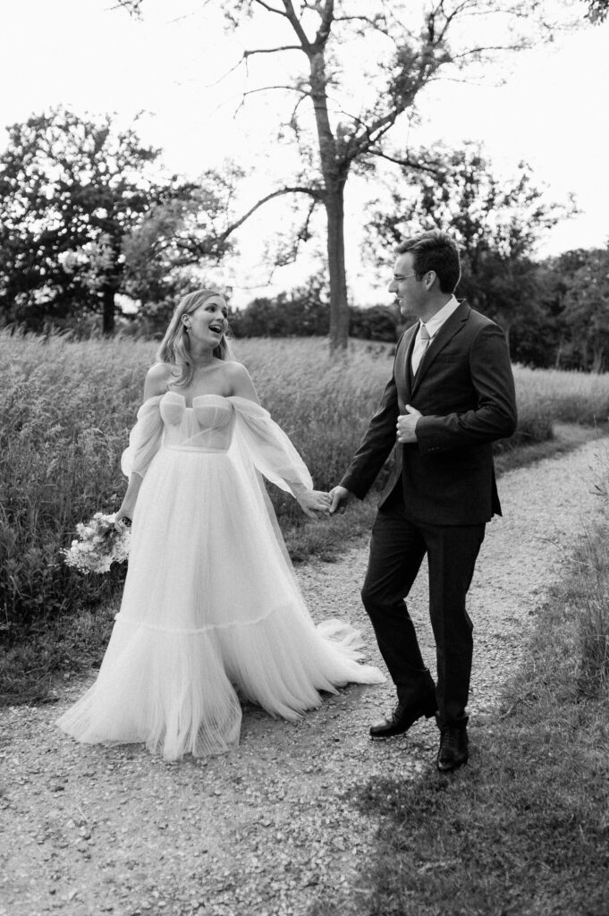 bride and groom walking at wilderness reserve 