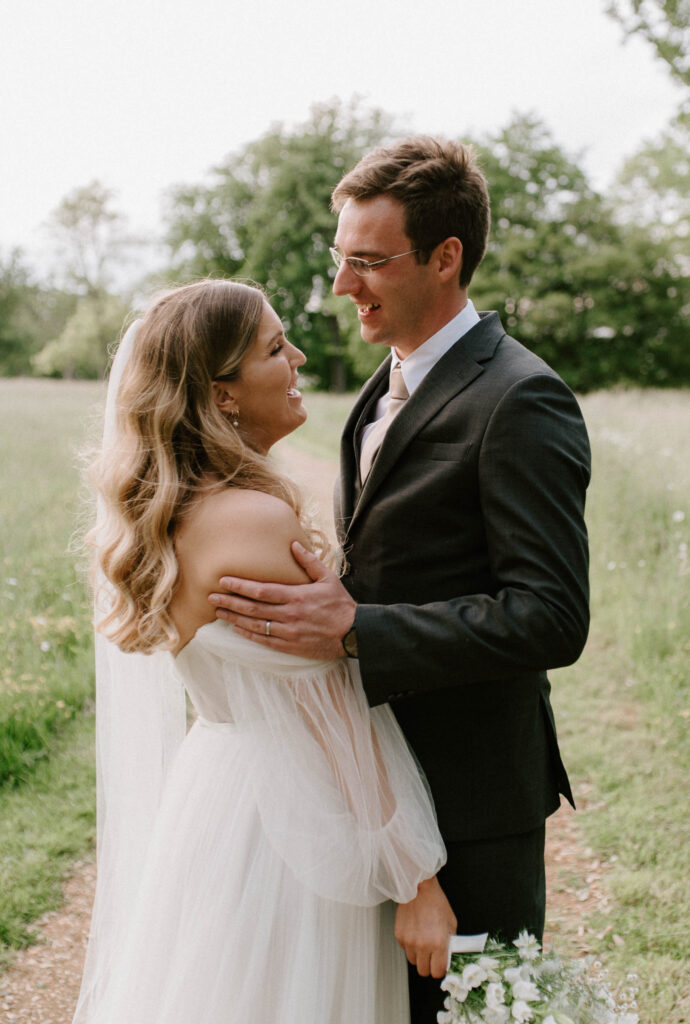 bride and groom looking at each other at wilderness reserve 