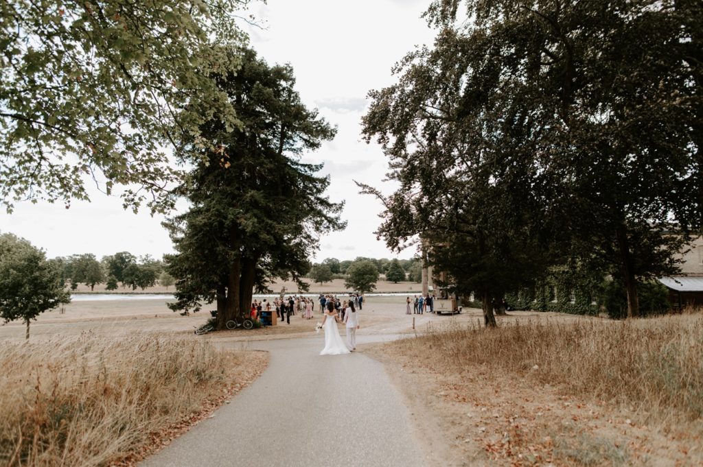 wilderness reserve wedding two brides walking away