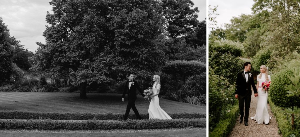couple walking through gardens at West Green house gardens 