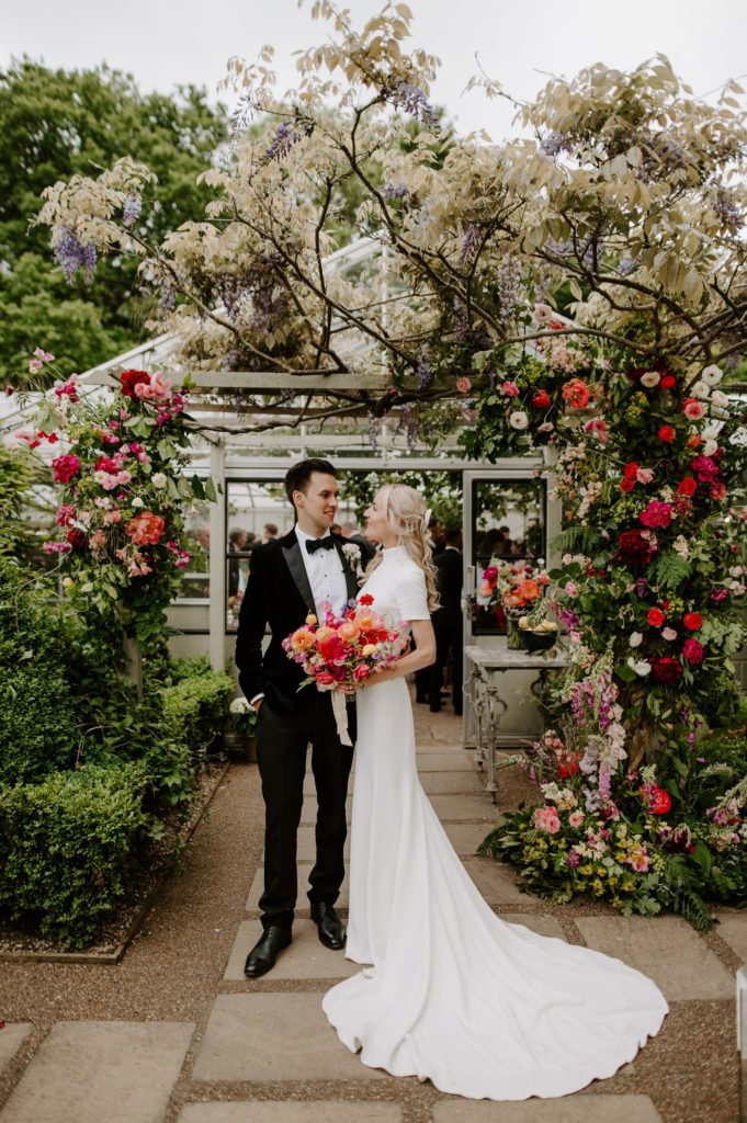 couple outside West Green house gardens 