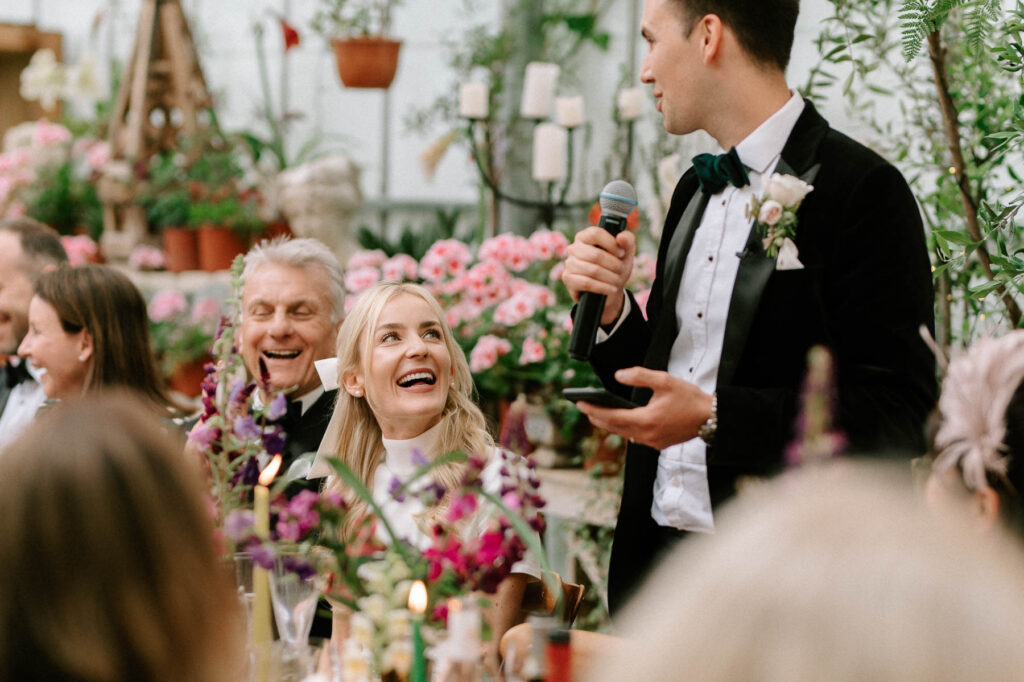 bride reaction to the grooms speech at West Green house gardens