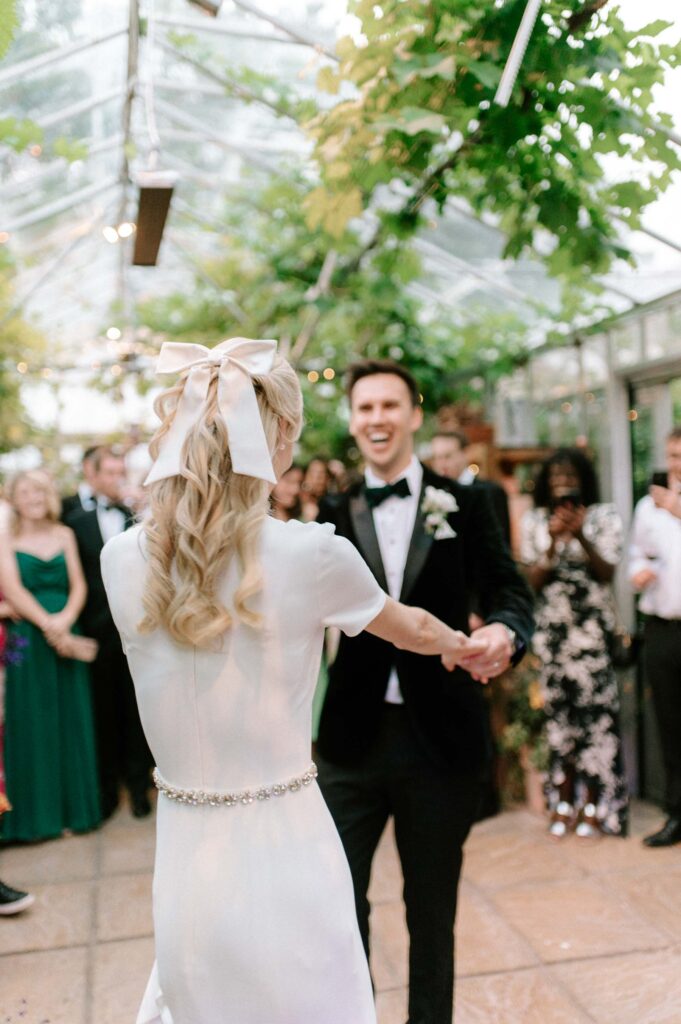 bride and groom having first dance at West Green house gardens