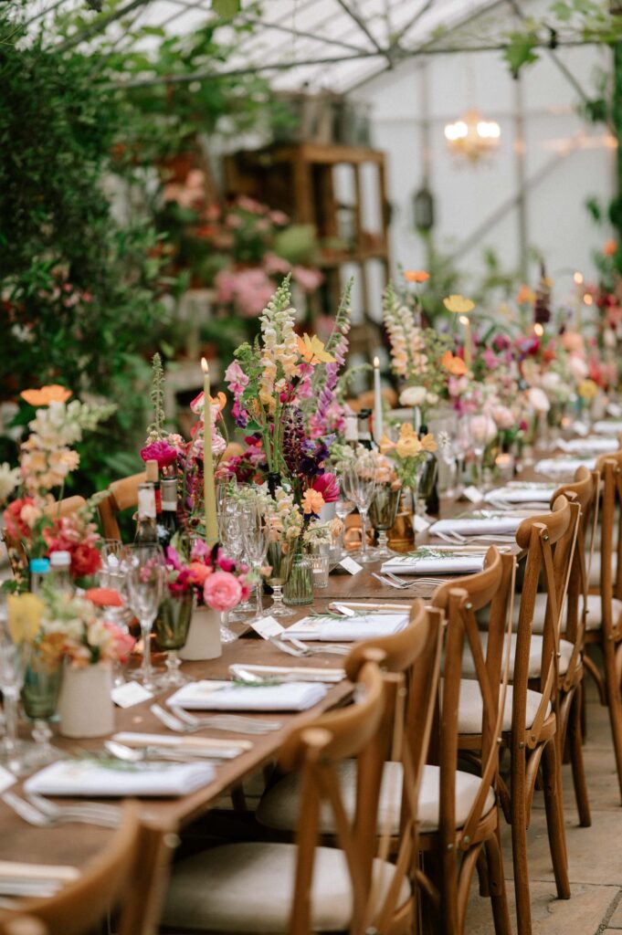 long table wedding reception set up at West Green house gardens conservatory wedding venue in hampshire