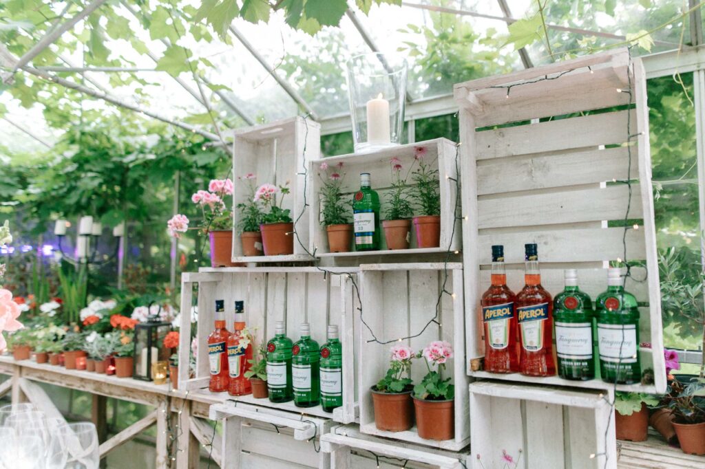 Aperol bar inside greenhouse at West Green house gardens