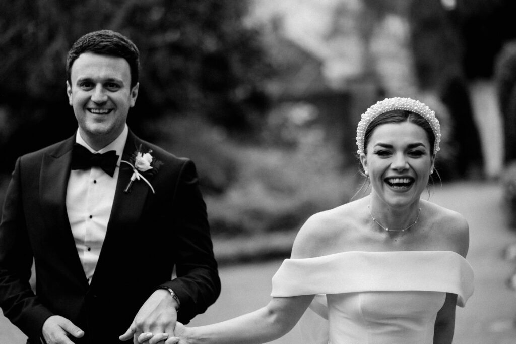bride and groom laughing