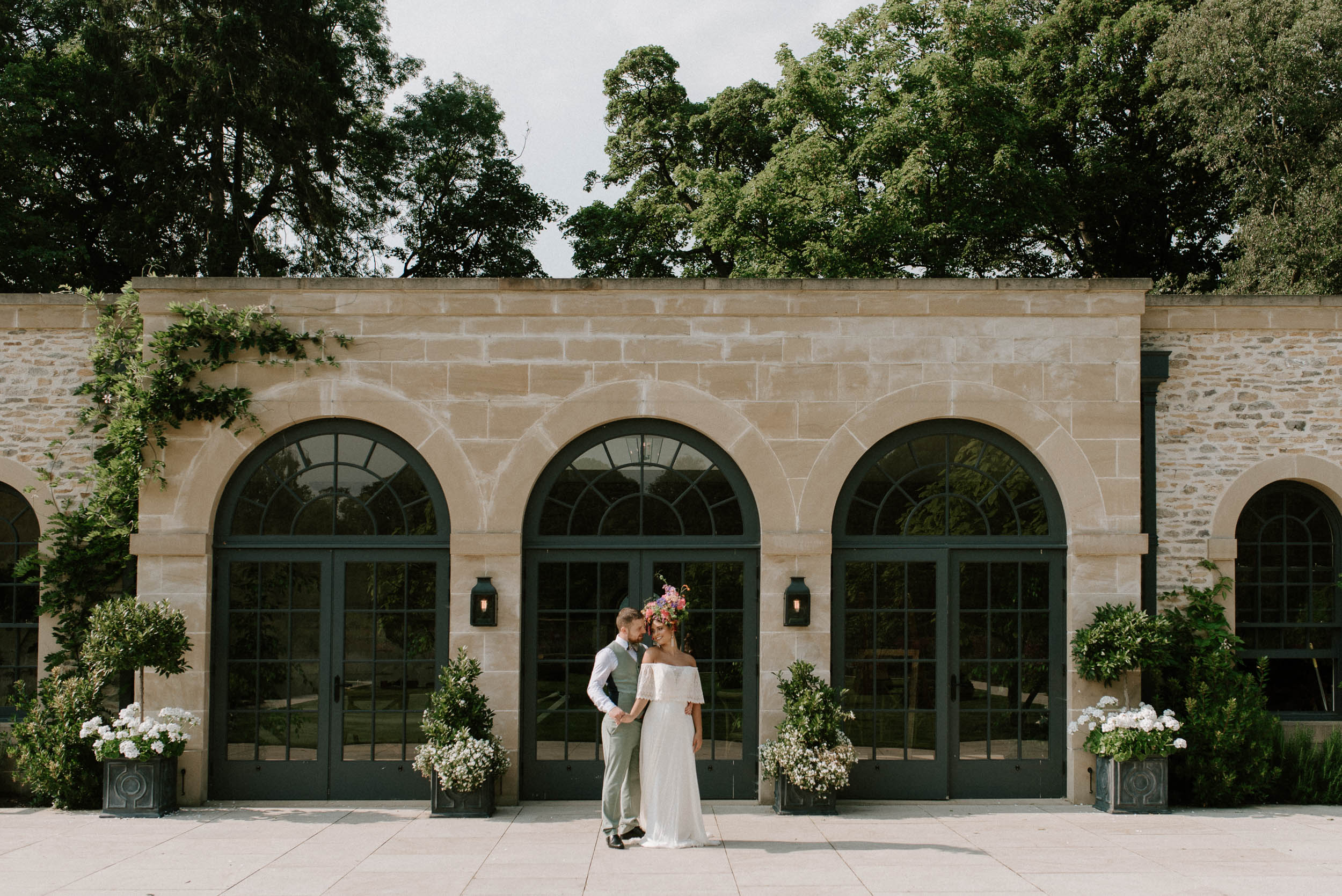 bride and groom standing outside Middleton Lodge wedding venue