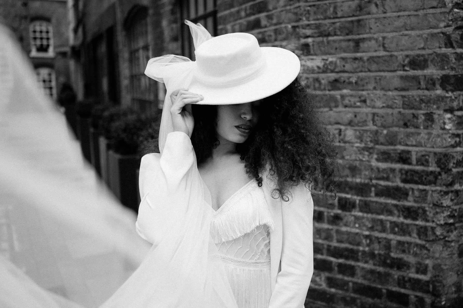 portrait of bride with hat with a veil