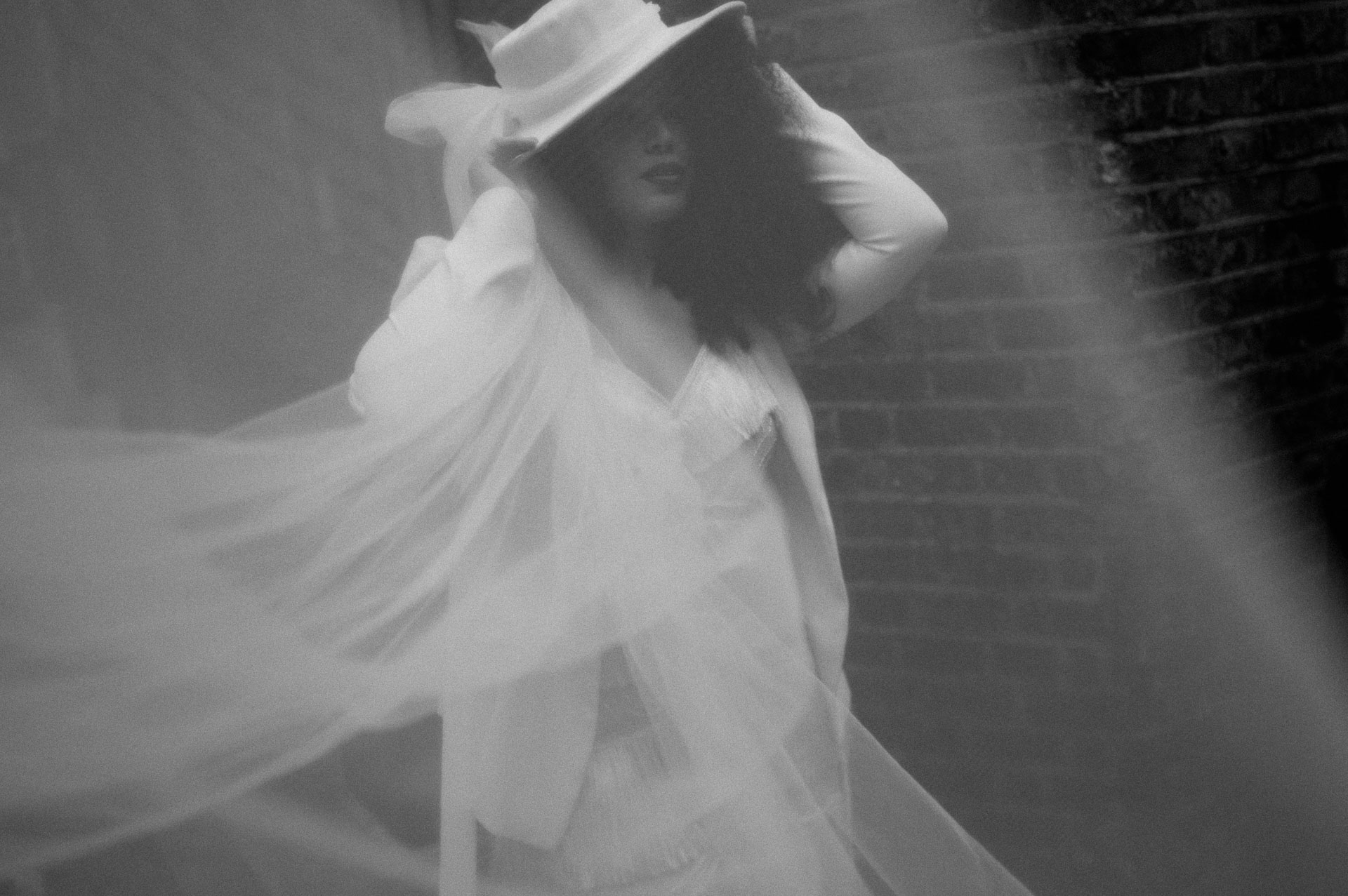 portrait of bride with hat with a veil