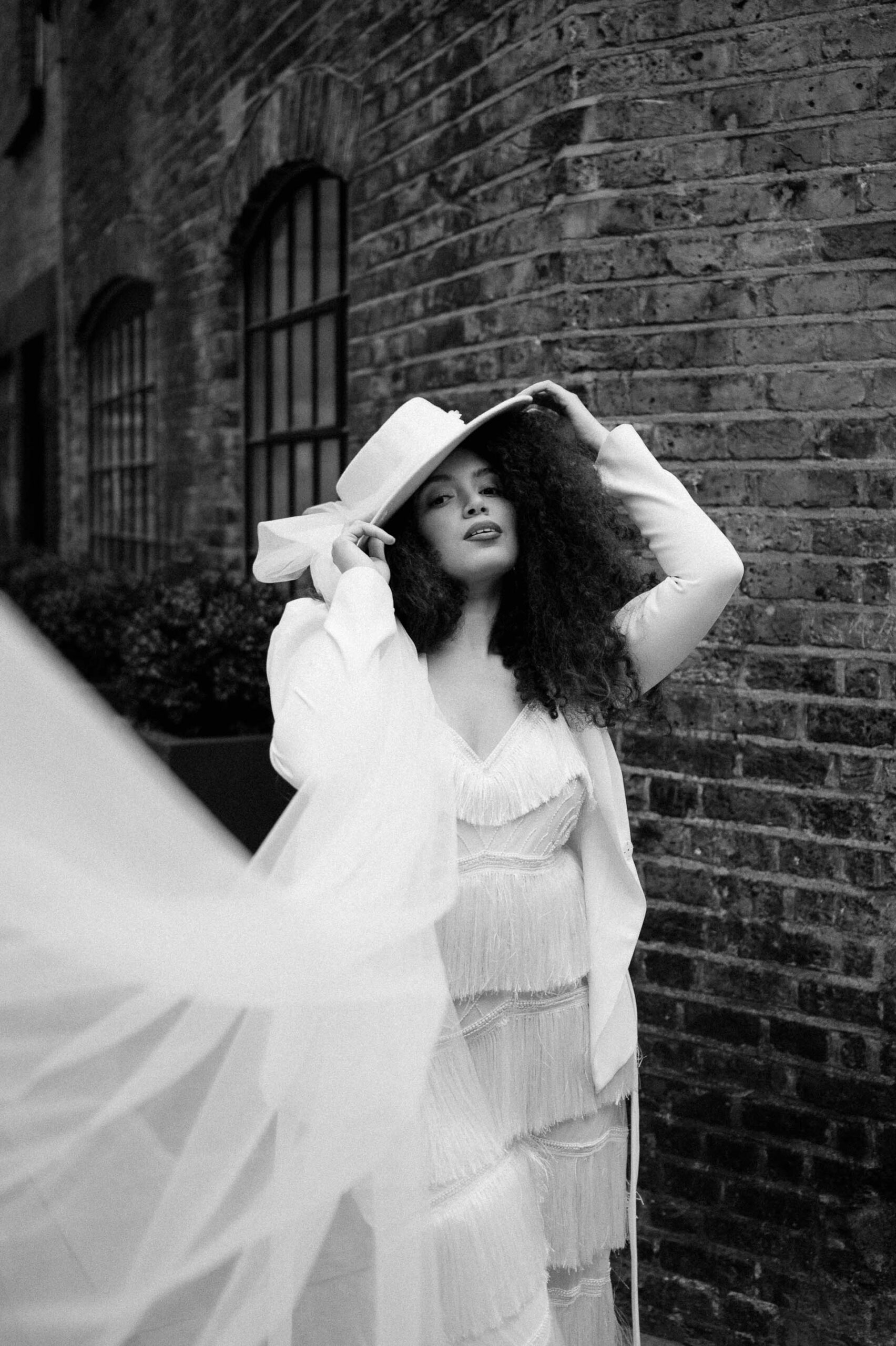 portrait of bride with hat and a veil
