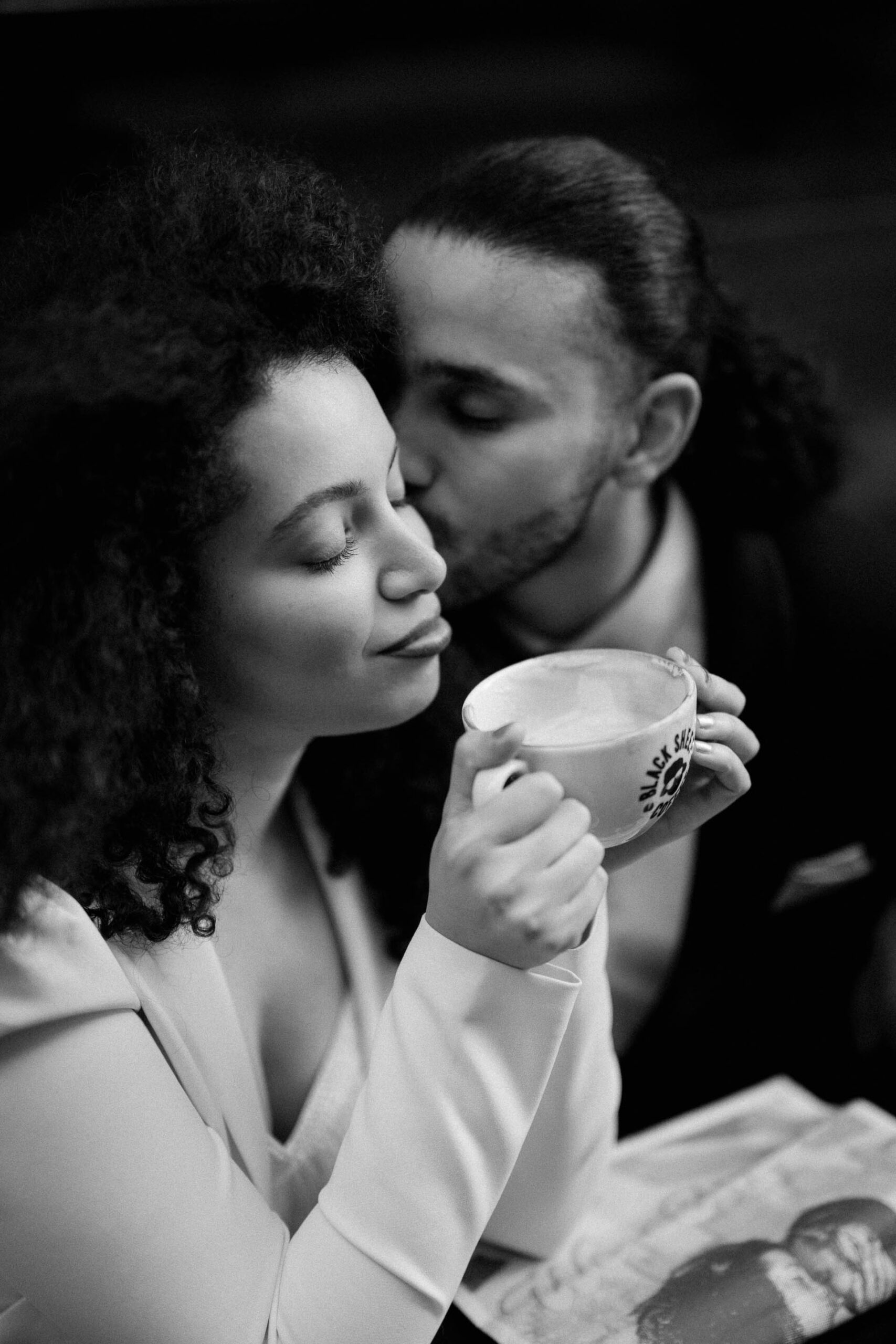 bride and groom at coffee shop drinking coffee 