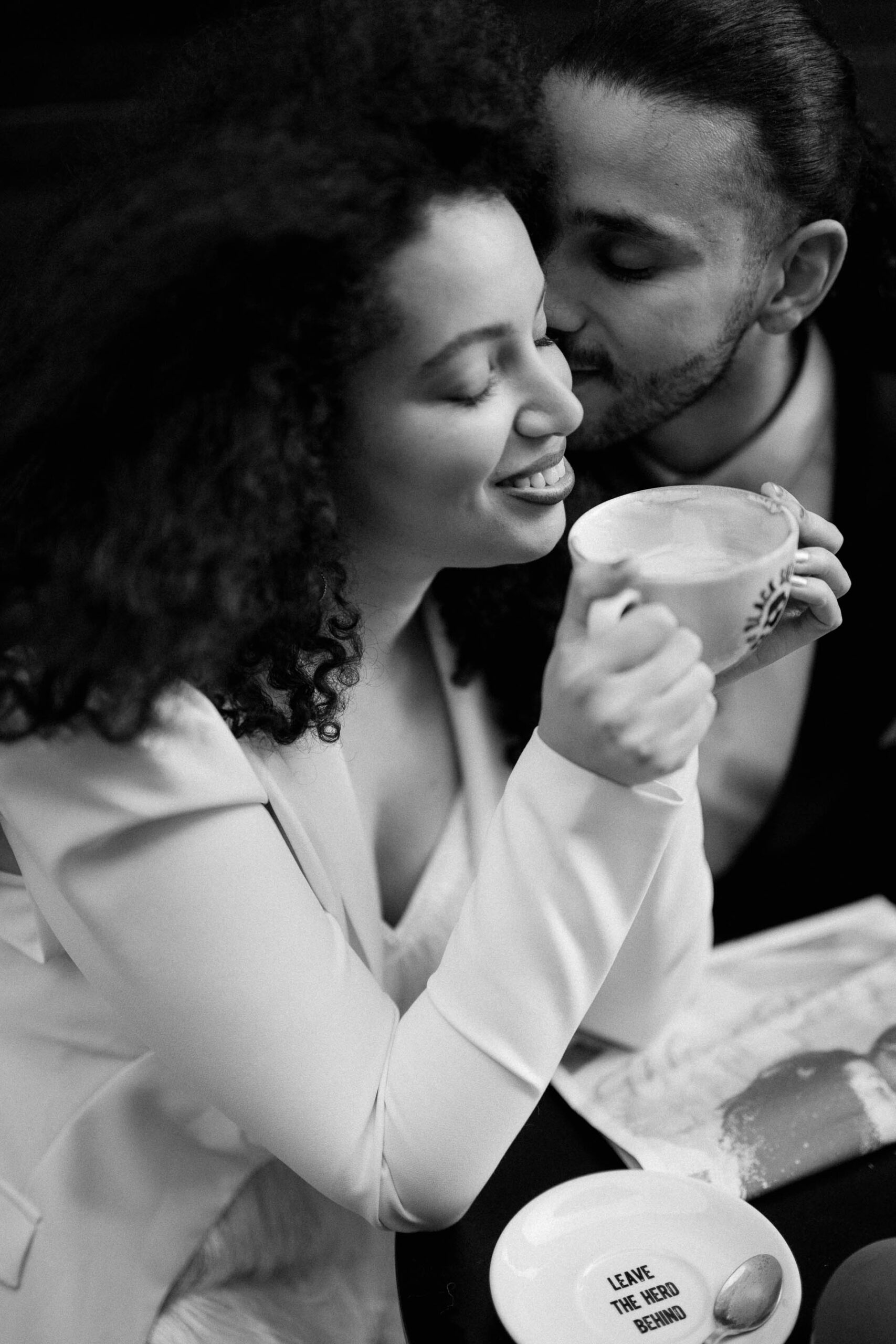 bride and groom at coffee shop drinking coffee 