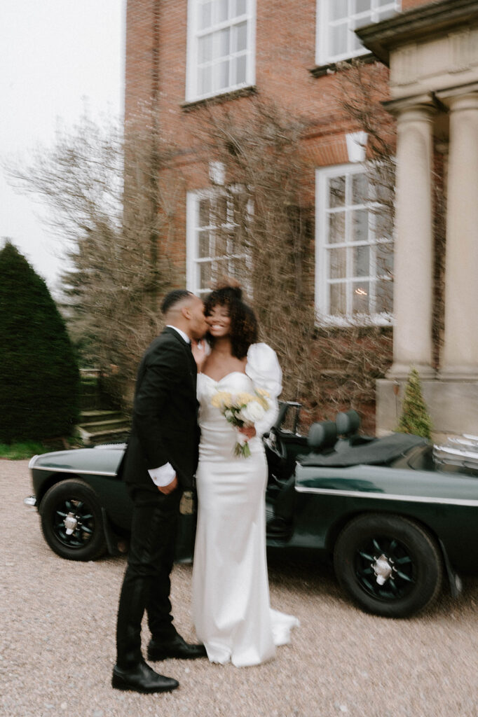 bride and groom outside Iscoyd park wedding venue