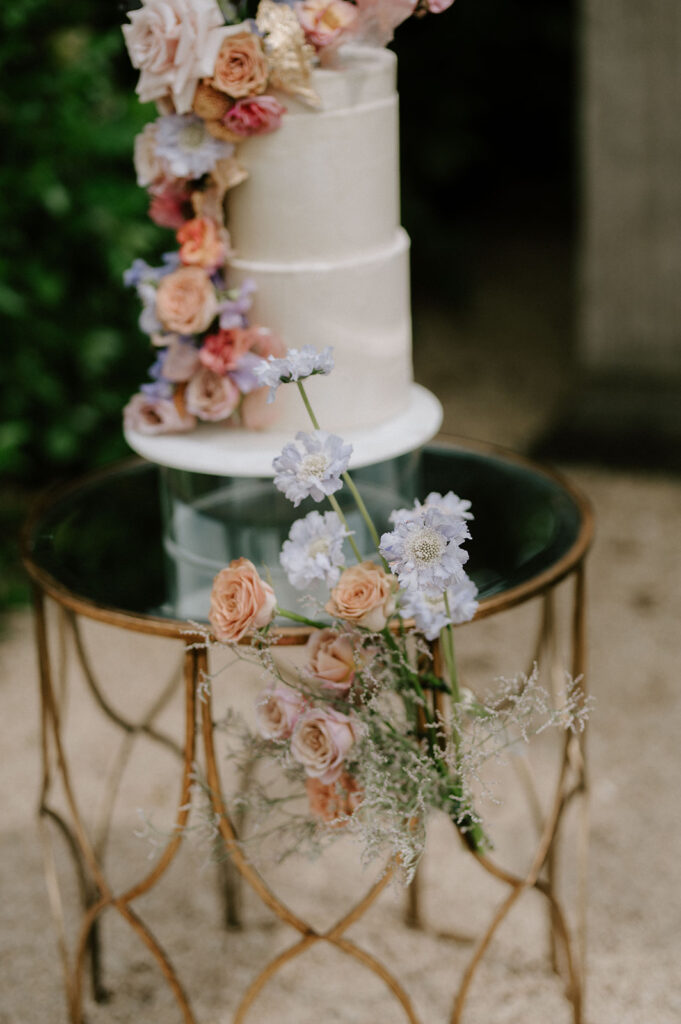 colourful 3 tier wedding cake in gardens of euridge manor