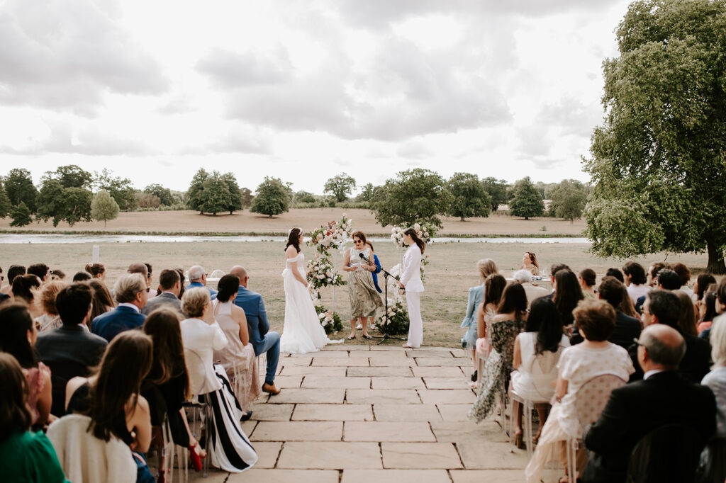 two brides sharing vows