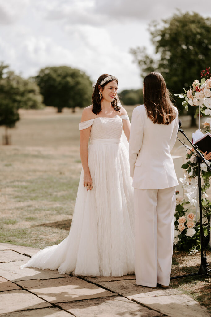two brides sharing vows