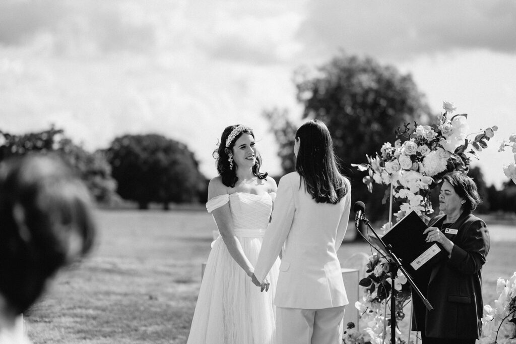 two brides sharing vows