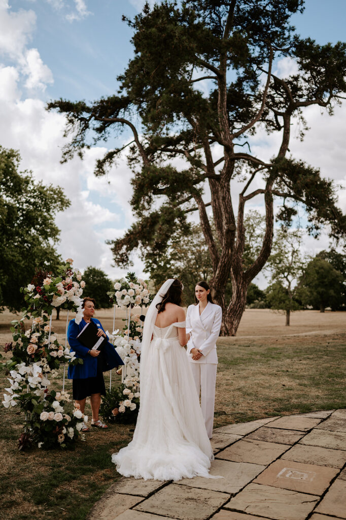two brides sharing vows