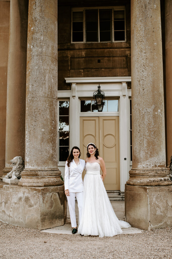 brides smiling outside sibton park at wilderness reserve