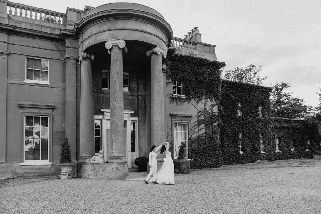 brides dancing outside Sibton park
