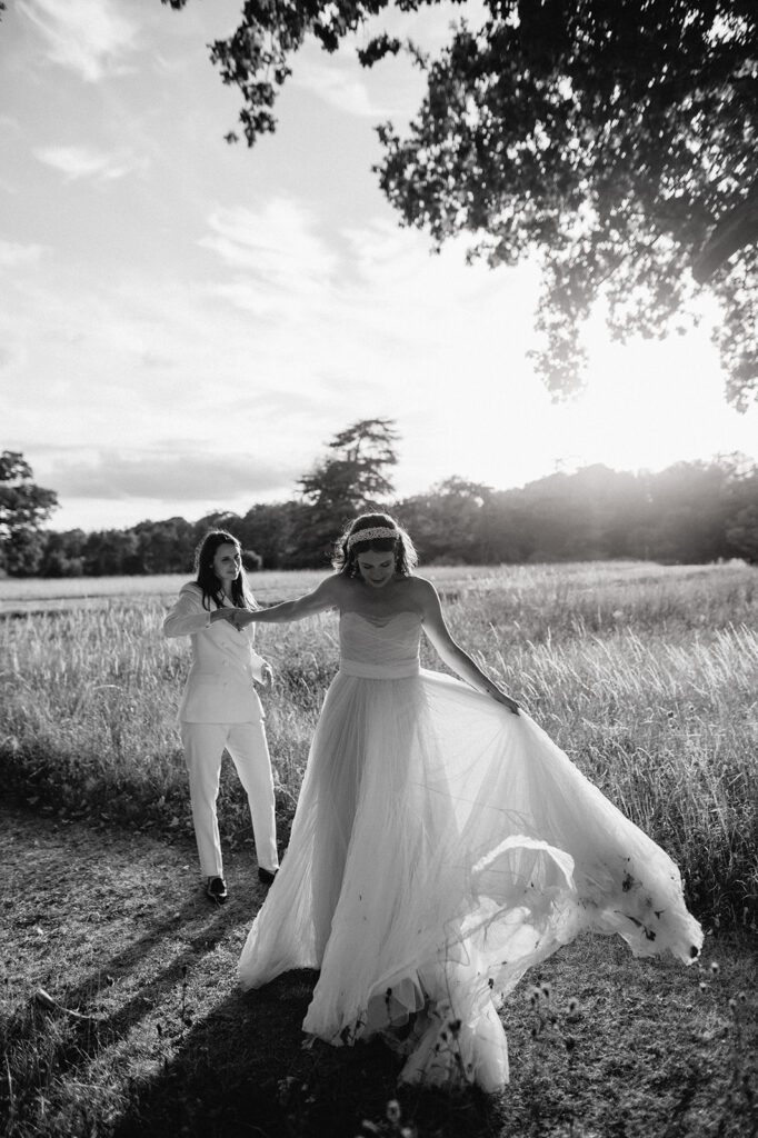 brides dancing at golden hour