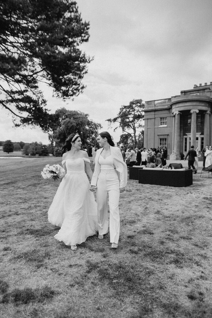 bride and groom walking away from wedding reception