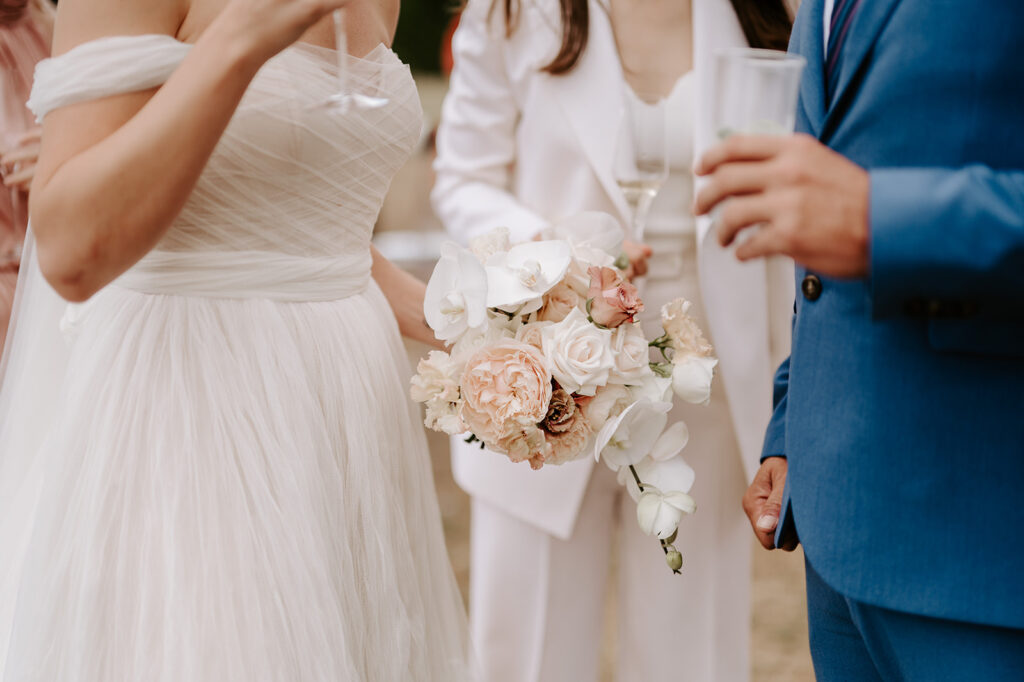 bride bouquet made of roses and orchids