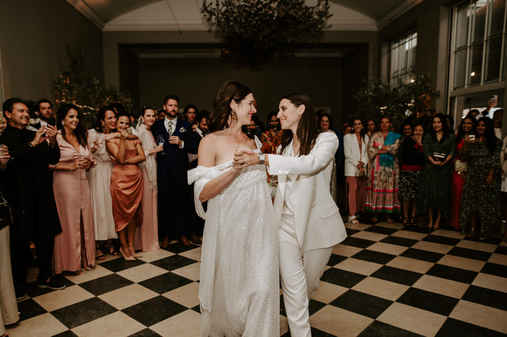 two brides having first dance in orangery at Sibton park at wilderness reserve