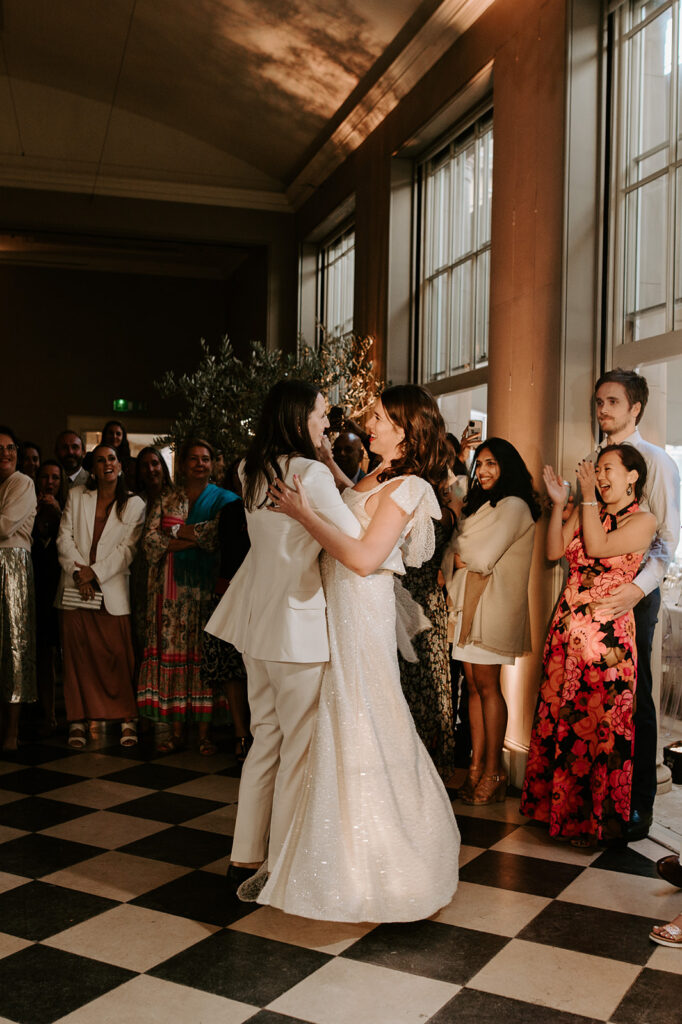 two brides having first dance in orangery at wilderness reserve