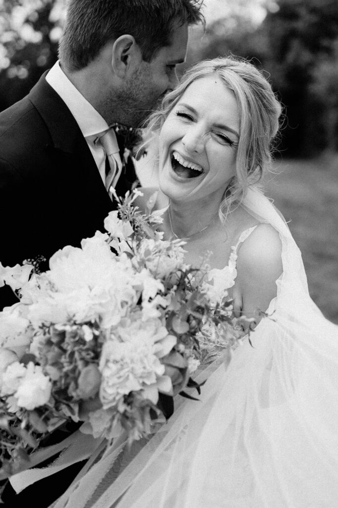 couple laughing at retreat east wedding venue