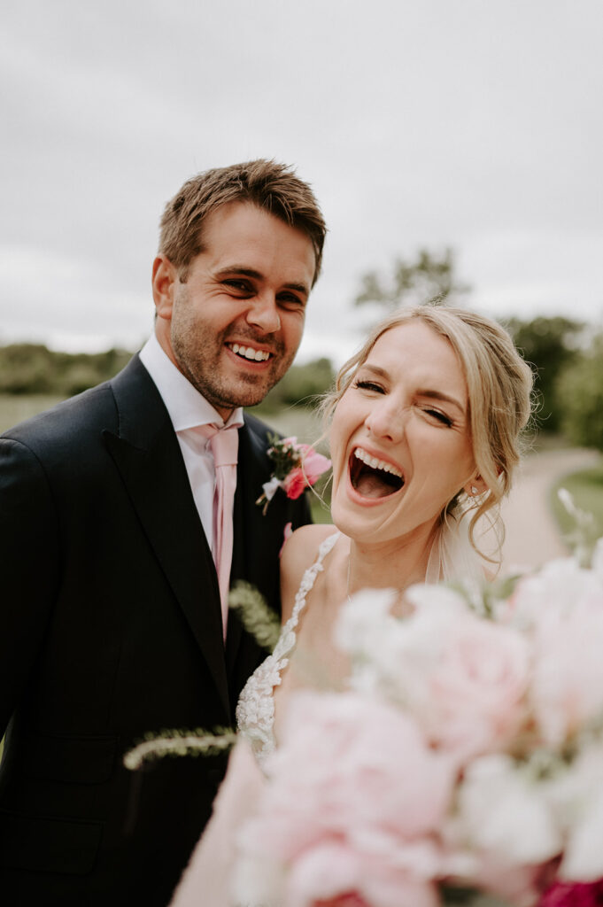 couple laughing at each other at retreat east 