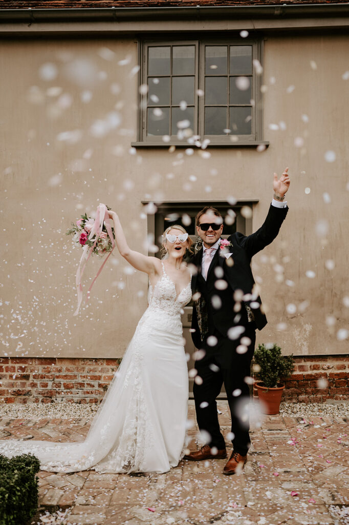 couple throwing confetti 