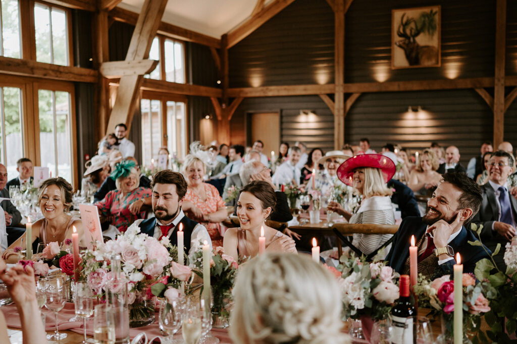 guests reactions to speeches at retreat east wedding