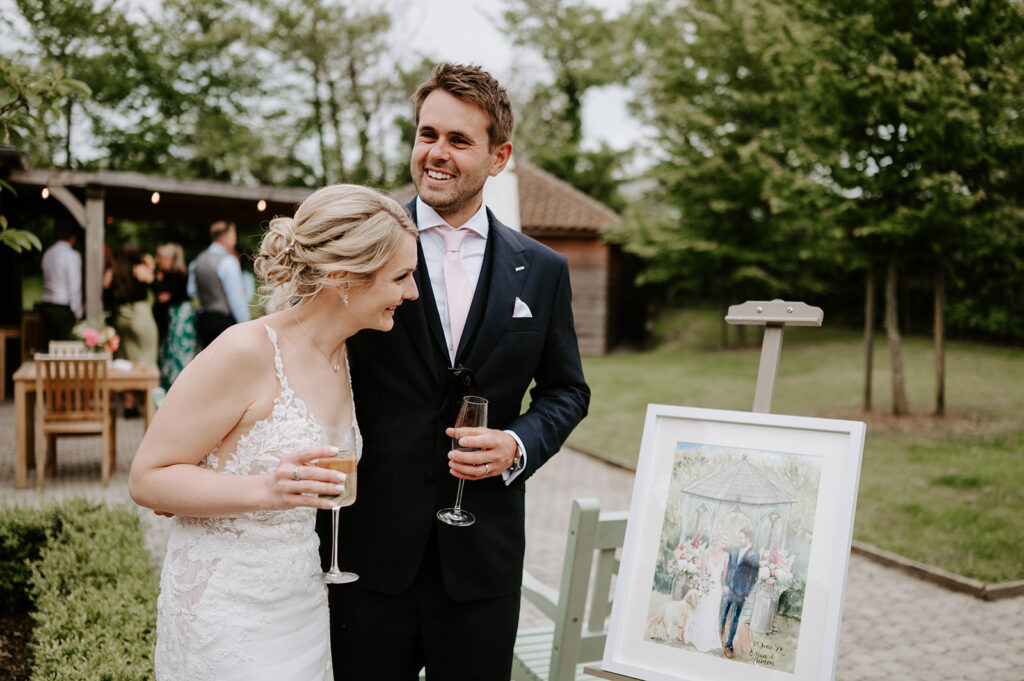couple with live painting at retreat east