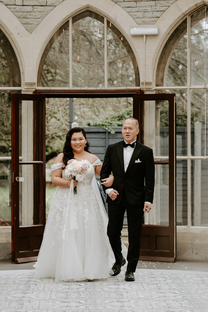 bride and father walking down the aisle