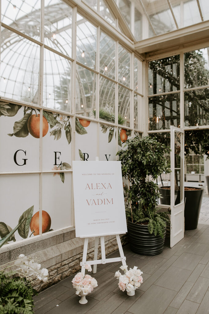 welcome sign with blush pink florals 