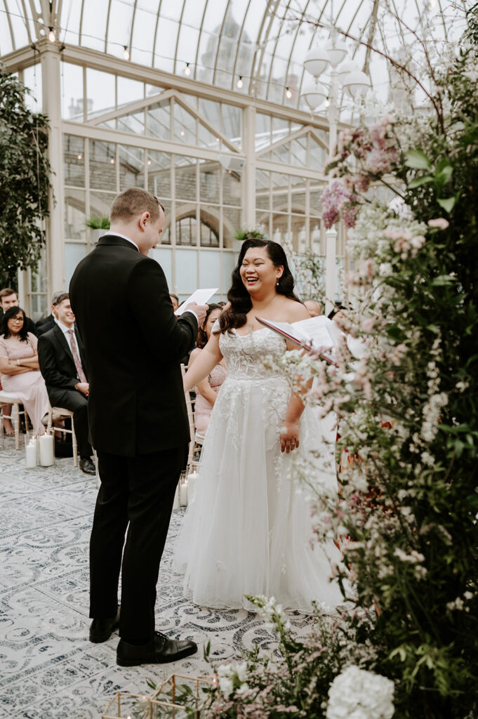 bride and groom saying personal vows at tortworth court 