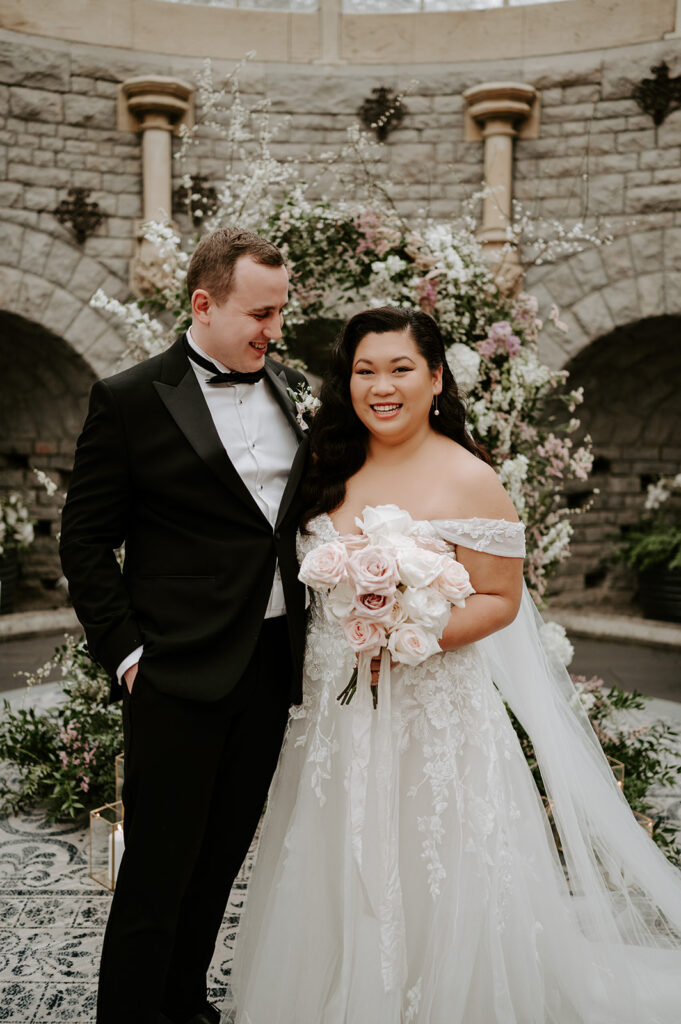 bride and groom in orangery at tortworth court
